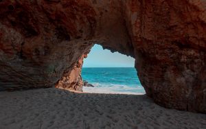 Превью обои пляж, скала, пещера, море, песок, вода