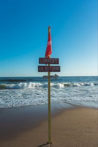 Превью обои пляж, указатель, табличка, флаг