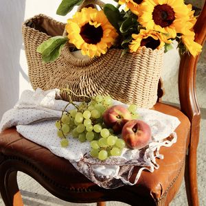 Превью обои подсолнухи, виноград, персик, корзинка, стул, цветы