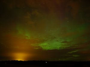 Превью обои поле, облака, закат, северное сияние, звезды, небо, темный