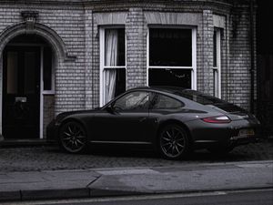 Превью обои porsche 911 carrera s, porsche, автомобиль, спорткар, черный, вид сбоку