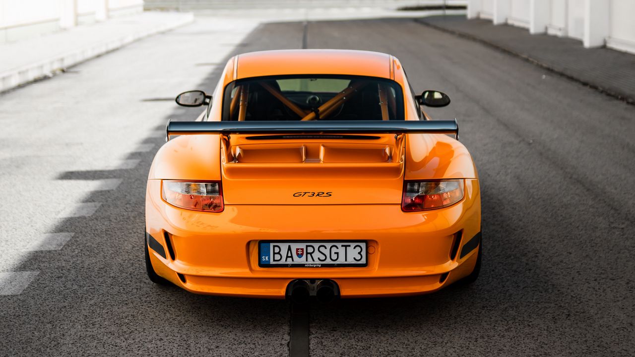 Обои porsche 911 gt3 rs, porsche, автомобиль, оранжевый, вид сзади