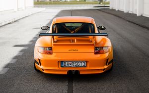 Превью обои porsche 911 gt3 rs, porsche, автомобиль, оранжевый, вид сзади