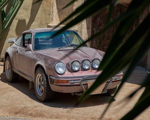 Превью обои porsche 911, porsche, автомобиль, тюнинг, вид спереди, фары