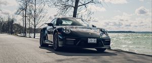 Превью обои porsche 911, porsche, автомобиль, черный, скорость, дорога