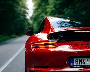 Превью обои porsche 911, porsche, машина, спорткар, красный, вид сзади, дорога
