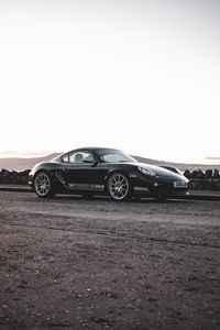 Превью обои porsche cayman 987 r, porsche, автомобиль, спорткар, черный, вид сбоку