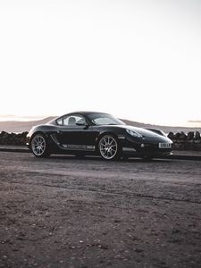 Превью обои porsche cayman 987 r, porsche, автомобиль, спорткар, черный, вид сбоку