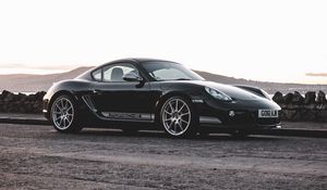 Превью обои porsche cayman 987 r, porsche, автомобиль, спорткар, черный, вид сбоку