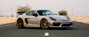 Превью обои porsche cayman, porsche, автомобиль, серый, дорога