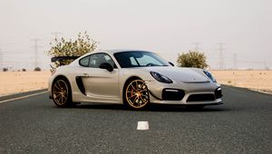 Превью обои porsche cayman, porsche, автомобиль, серый, дорога