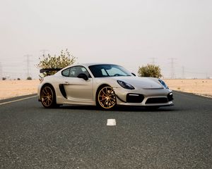 Превью обои porsche cayman, porsche, автомобиль, серый, дорога