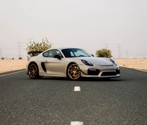 Превью обои porsche cayman, porsche, автомобиль, серый, дорога