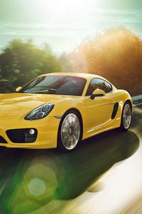 Превью обои porsche cayman, желтый, движение, дорога, поворот