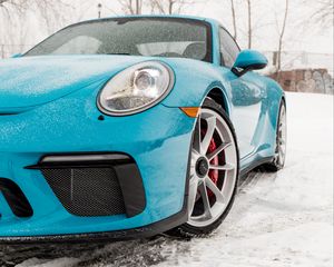 Превью обои porsche, фара, колесо, снегопад