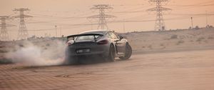 Превью обои porsche gt4, porsche, автомобиль, серый, дрифт, дым, трасса