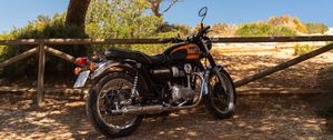 Превью обои royal enfield, мотоцикл, оранжевый, дерево, тени