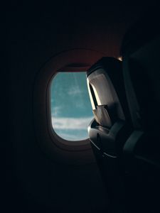 Превью обои самолет, окно, иллюминатор, темный