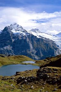 Превью обои швейцария, горы, озеро, камни, трава
