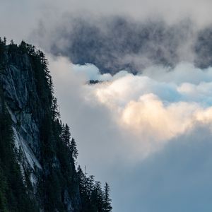 Превью обои скала, деревья, облака, гора, вершина