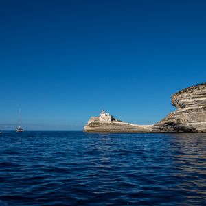 Превью обои скала, маяк, море, природа