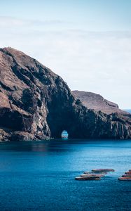 Превью обои скала, остров, море, лодки, вода