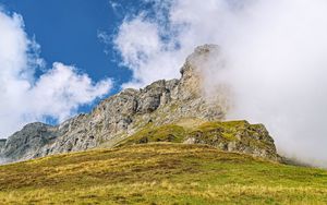 Превью обои скала, утес, туман, облака, трава