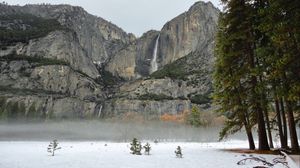 Превью обои скала, водопад, снег, деревья, туман, природа