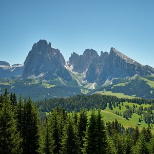 Превью обои скалы, горы, ель, деревья, небо