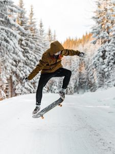 Превью обои скейтбордист, скейтборд, прыжок, трюк, снег, зима