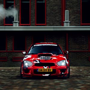 Превью обои subaru impreza sti wrx, subaru, спорткар, вид спереди, камуфляж, красный