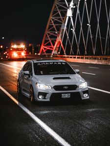 Превью обои subaru wrx, subaru, автомобиль, спорткар, вид спереди, дорога, иероглифы