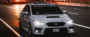 Превью обои subaru wrx, subaru, автомобиль, спорткар, вид спереди, дорога, иероглифы