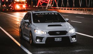 Превью обои subaru wrx, subaru, автомобиль, спорткар, вид спереди, дорога, иероглифы