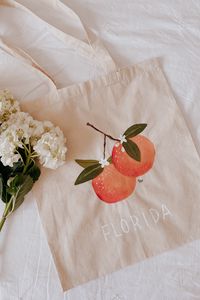 Превью обои сумка, персики, надпись, цветы, дизайн