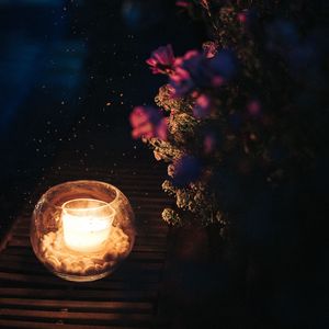 Превью обои свеча, искры, цветы, ночь, темный