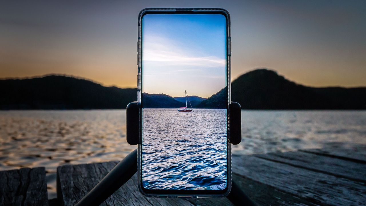 Обои телефон, лодка, озеро, фотография
