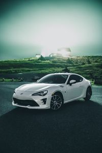 Превью обои toyota, автомобиль, спорткар, вид сбоку, белый