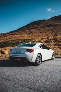 Превью обои toyota, автомобиль, спорткар, вид сзади, белый