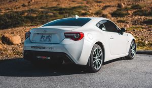 Превью обои toyota, автомобиль, спорткар, вид сзади, белый