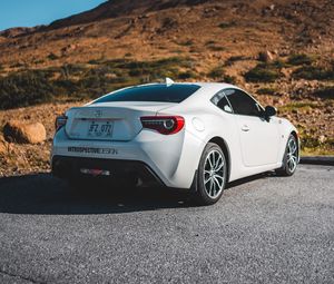 Превью обои toyota, автомобиль, спорткар, вид сзади, белый