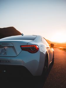 Превью обои toyota, автомобиль, спорткар, вид сзади, белый, закат