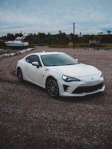 Превью обои toyota, автомобиль, вид сбоку, фары, белый