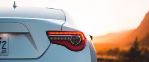 Превью обои toyota, автомобиль, вид сзади, фара, белый