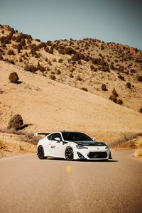 Превью обои toyota gt86, toyota, автомобиль, спорткар, белый, дорога, холмы