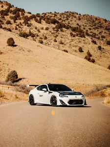 Превью обои toyota gt86, toyota, автомобиль, спорткар, белый, дорога, холмы