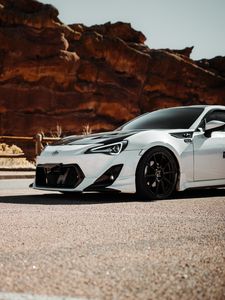 Превью обои toyota gt86, toyota, автомобиль, белый, дорога, скалы