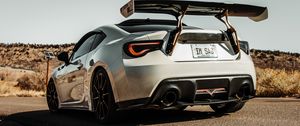 Превью обои toyota gt86, toyota, автомобиль, белый, дорога, вид сзади