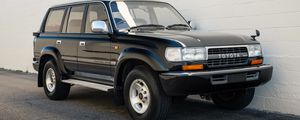 Превью обои toyota land cruiser, toyota, автомобиль, черный, внедорожник