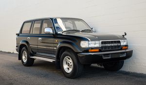 Превью обои toyota land cruiser, toyota, автомобиль, черный, внедорожник